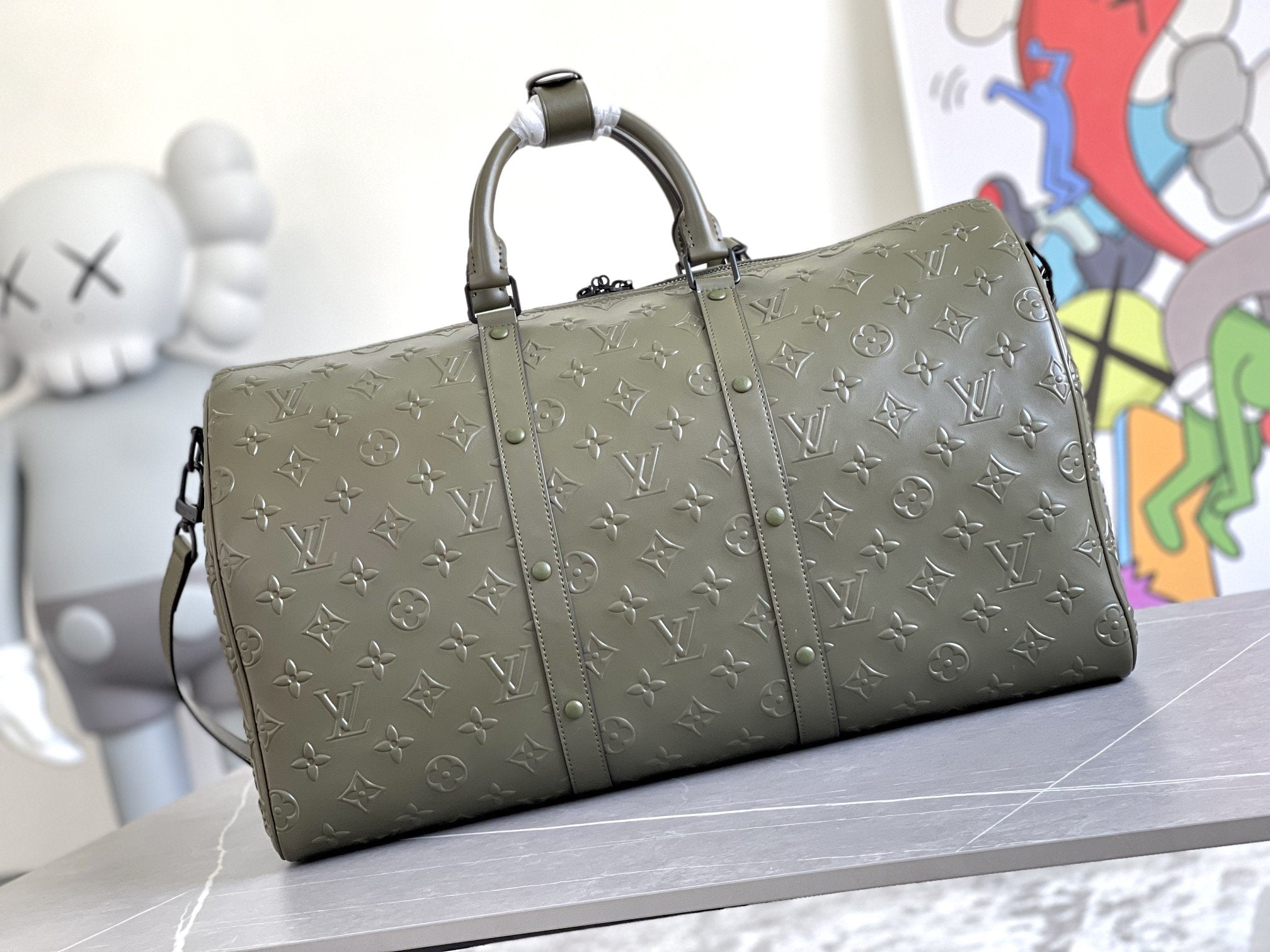 KEEPALL 50 BANDOULIERE KAKI EMPREINTE CUIR