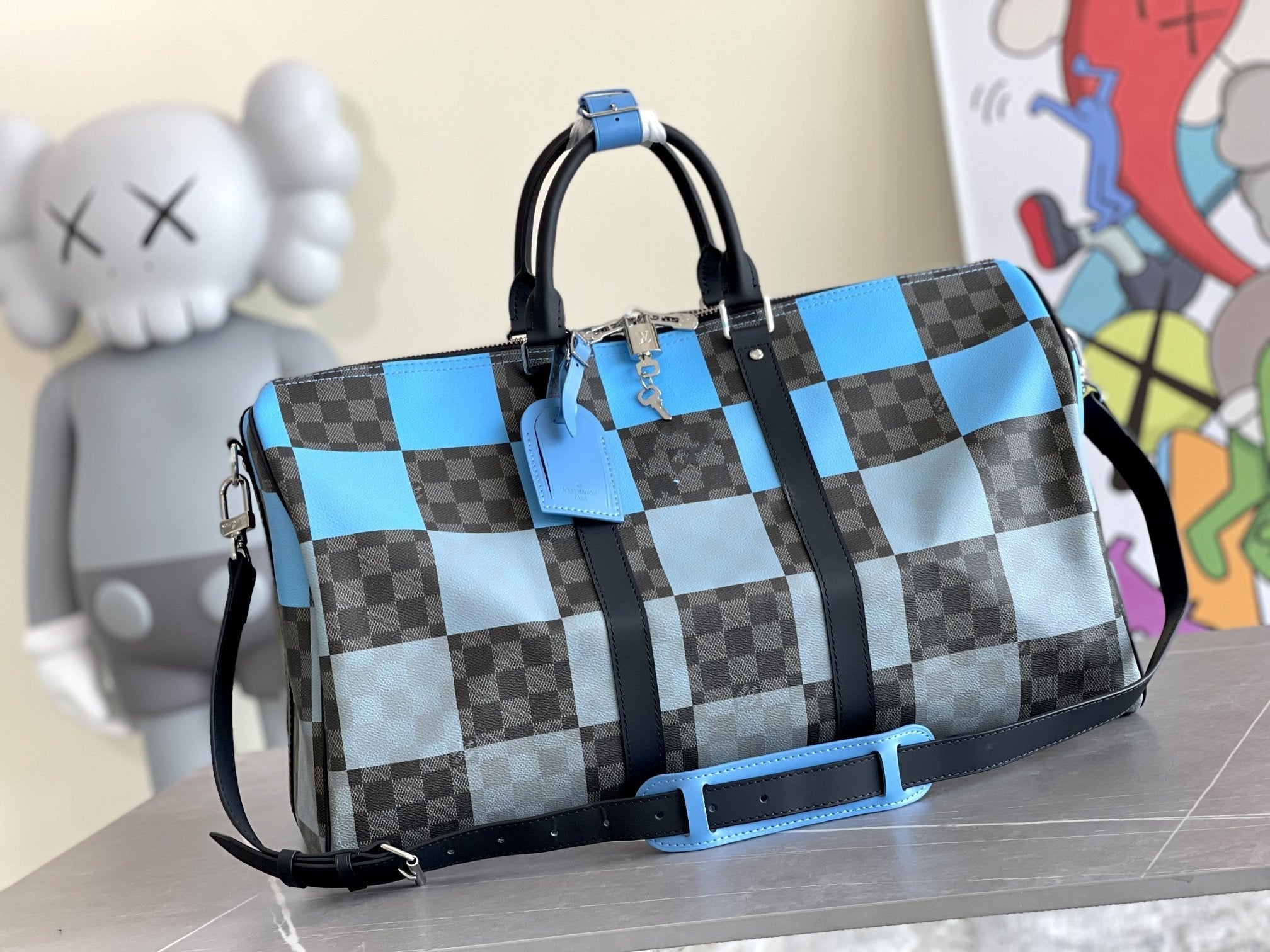 KEEPALL 50 BANDOULIÈRE BLEU DAMIER GRAPHITE 