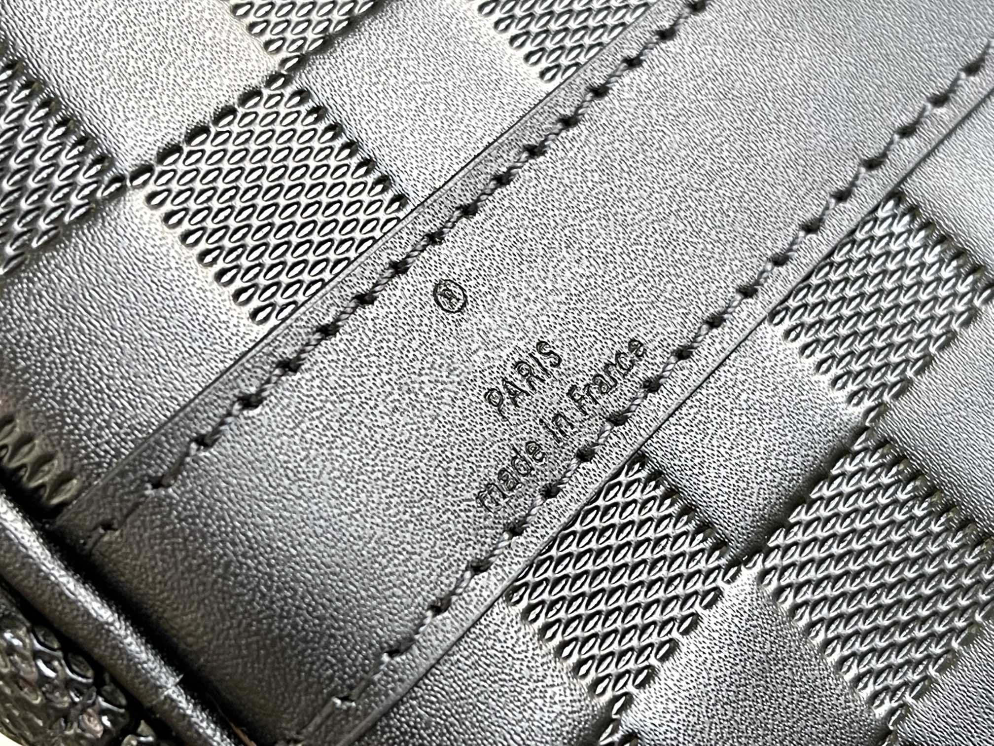 KEEPALL 45 BANDOULIERE NOIR EMPREINTE INFINI 