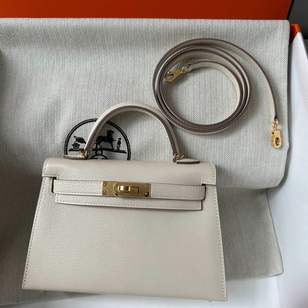 HM KELLY MINI 20 BLANC CHEVRE FERMOIR DORÉ
