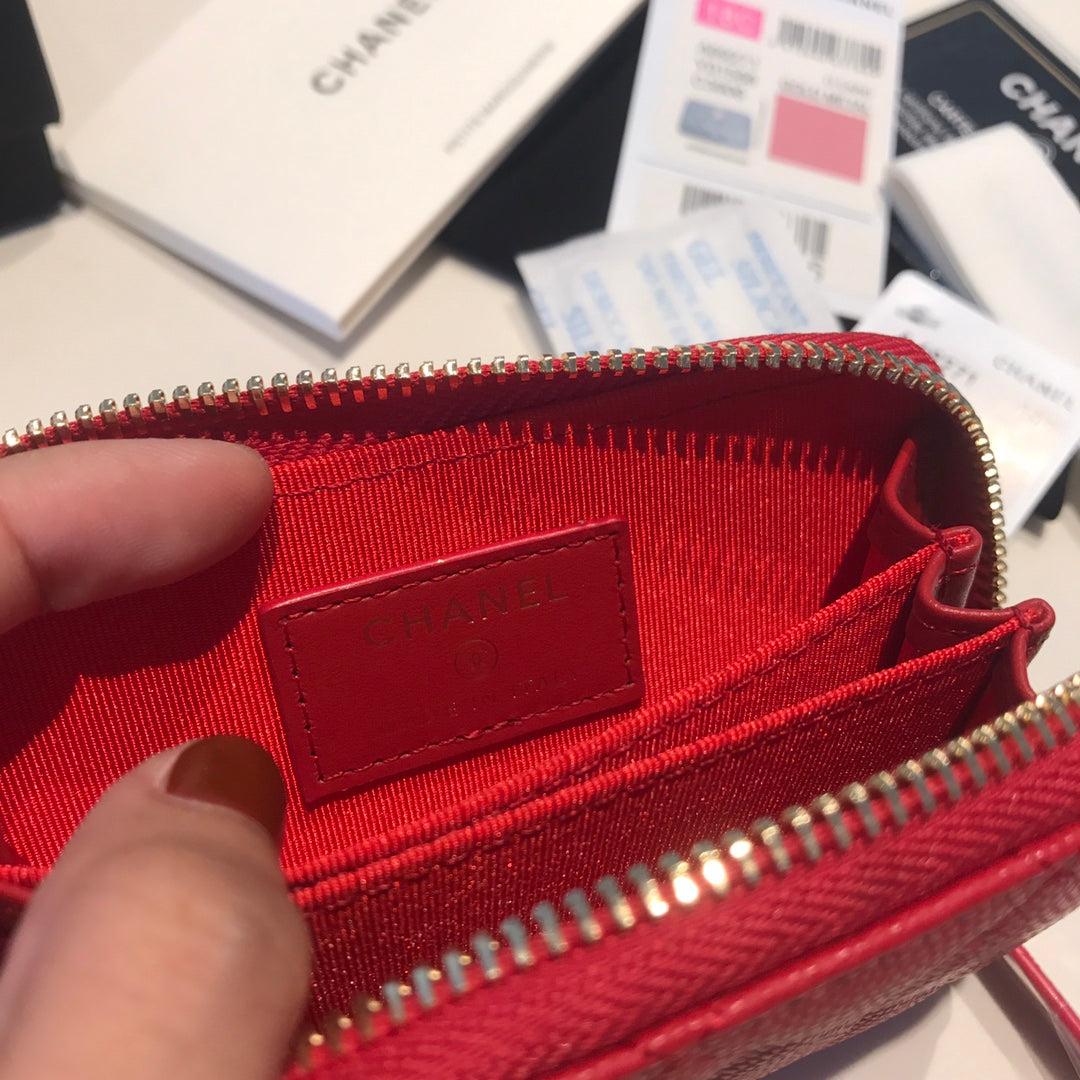 Porte-monnaie basique zippé CC 11 en cuir de veau rouge avec icône dorée