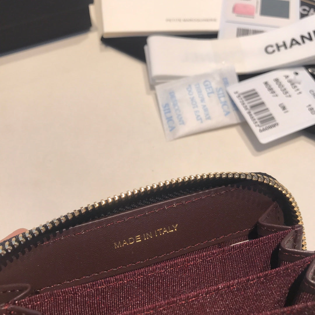 Sac à main zippé CC en cuir de veau noir avec icône dorée