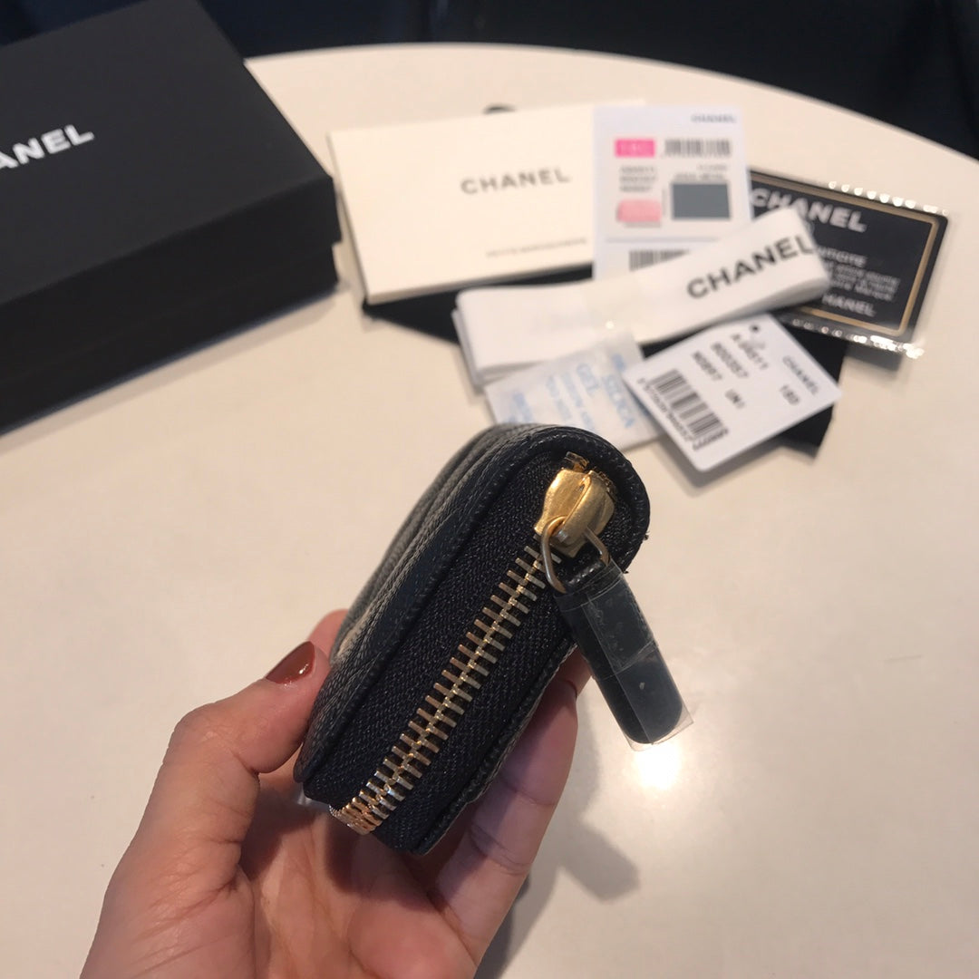 Sac à main zippé CC en cuir de veau noir avec icône dorée