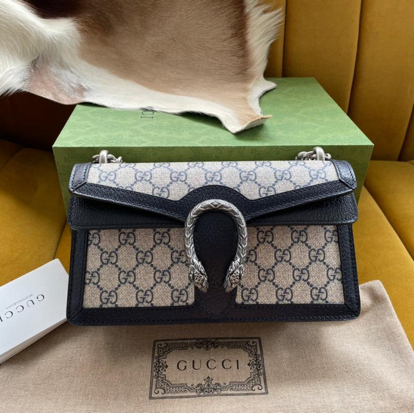 SAC À BANDOULIÈRE DYONYSUS 25 EN TISSU JACQUARD BEIGE AVEC GARNITURE EN CUIR DE VEAU NOIR ET FERMOIR ARGENTÉ