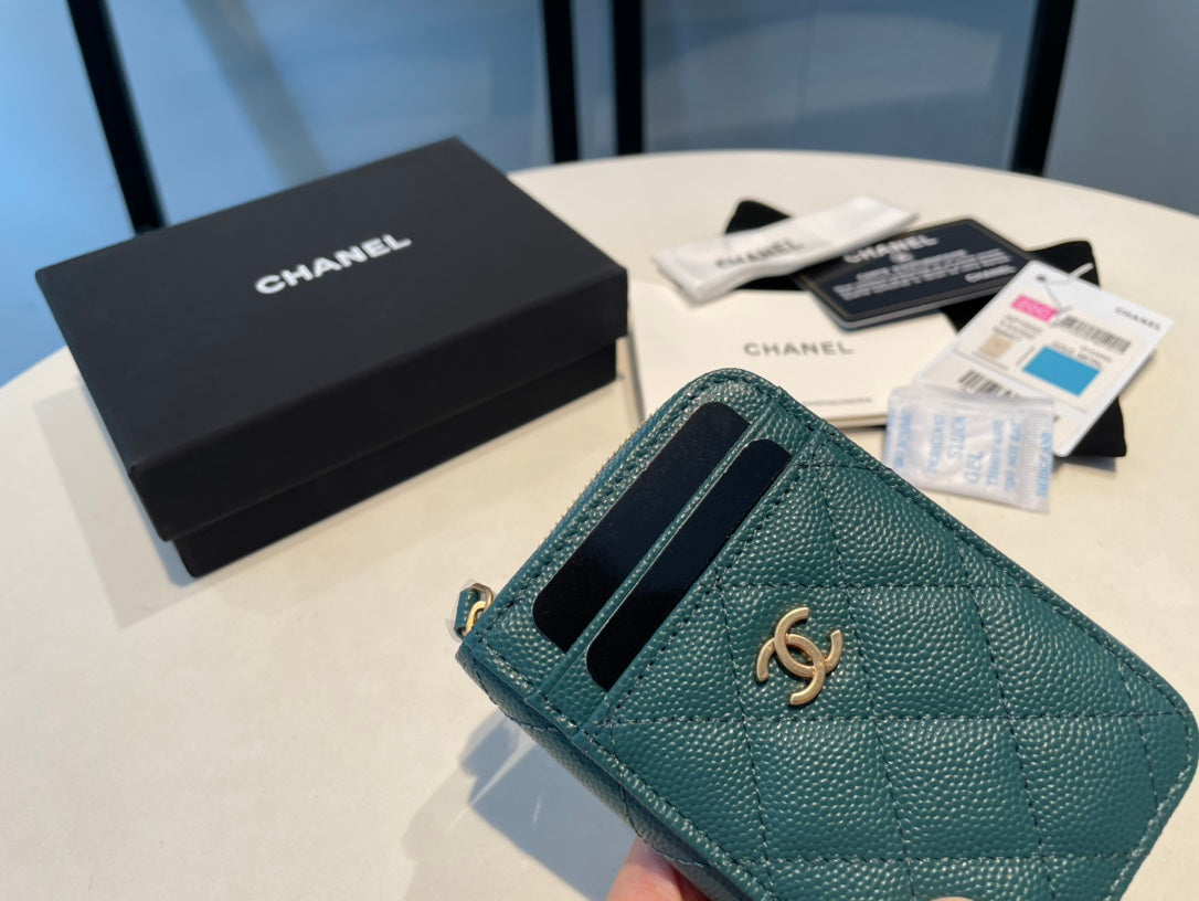 Porte-monnaie zippé CC 11 en cuir de veau grainé océan