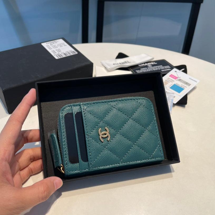 Porte-monnaie zippé CC 11 en cuir de veau grainé océan