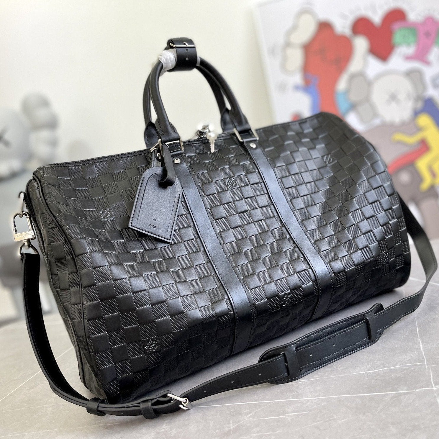 KEEPALL 45 BANDOULIERE NOIR EMPREINTE INFINI 