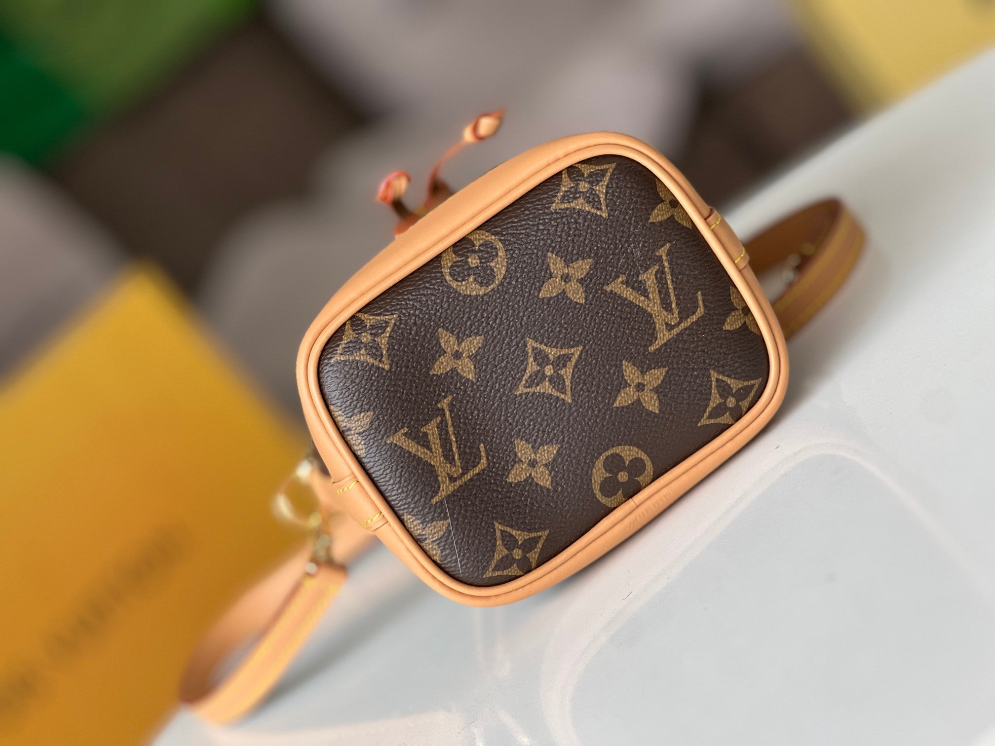 LV 25S NANO NOÉ 16 IN DARK BROWN MONOGRAM COATED CANVAS LEATHER TRIM