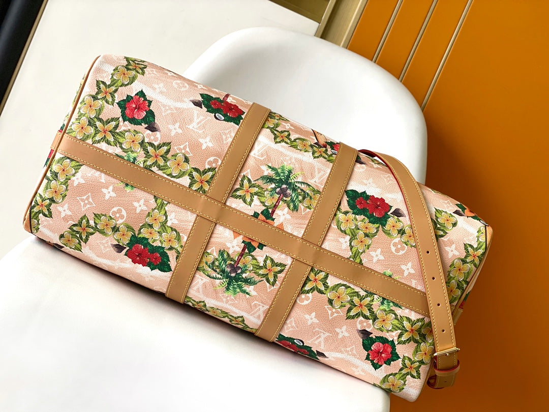 KEEPALL BANDOULIÈRE 50 EN TOILE SURFIN SABLE MOTIFS TROPICAUX MONOGRAMME