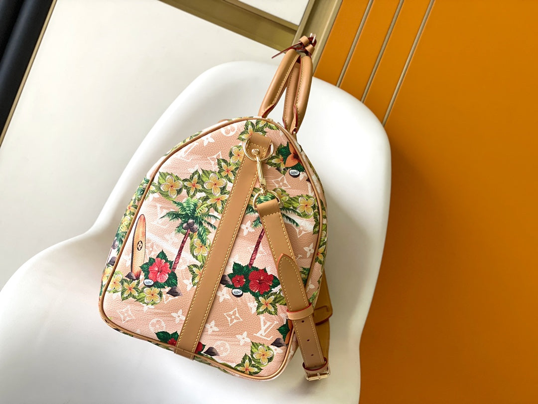 KEEPALL BANDOULIÈRE 50 EN TOILE SURFIN SABLE MOTIFS TROPICAUX MONOGRAMME
