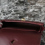 BOTTEGA VENETA 25S ANDIAMO POUCH 19 IN DEEP MAROON CALFSKIN GOLD HARDWARE