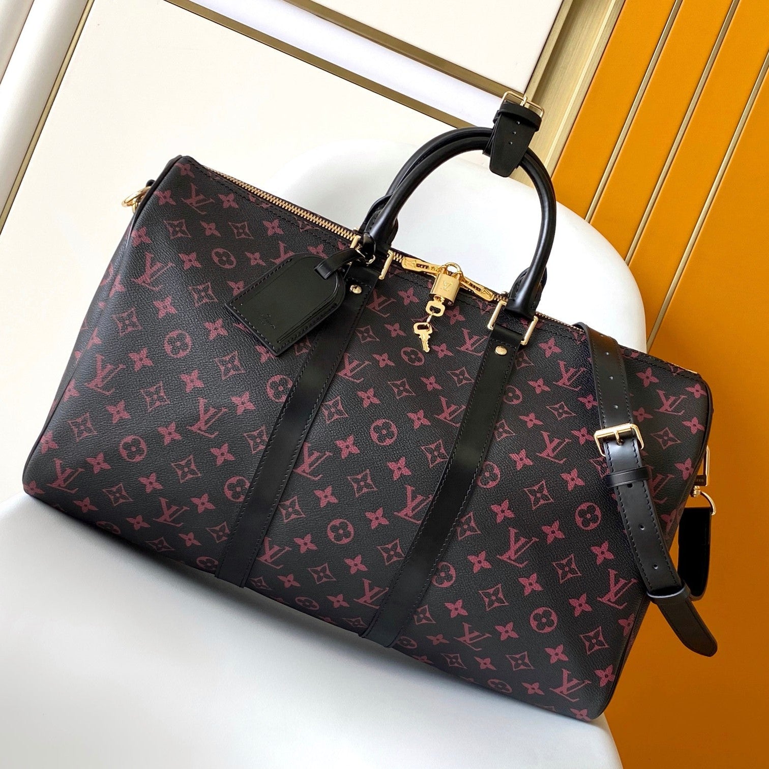 KEEPALL BANDOULIÈRE 45 EN TOILE TOMETTE MONOGRAMME NOIRE