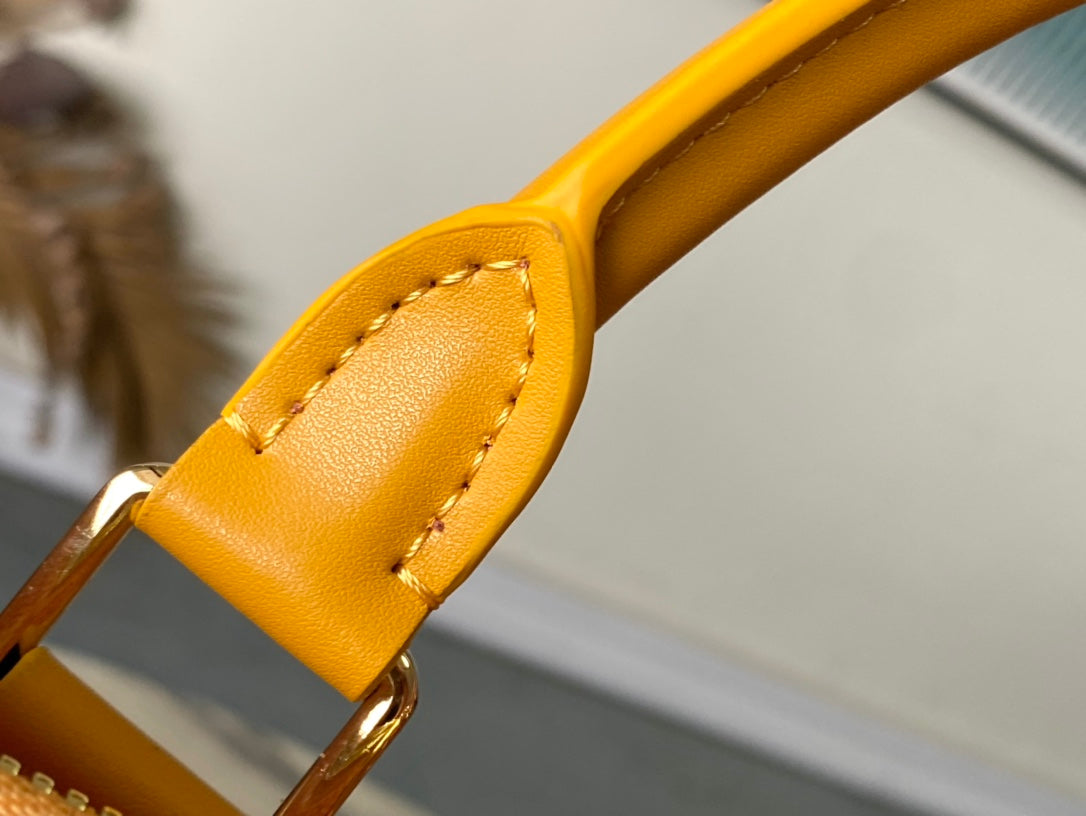 KEEPALL BANDOULIÈRE 55 EN TOILE HERITAGE MONOGRAMME ORANGE