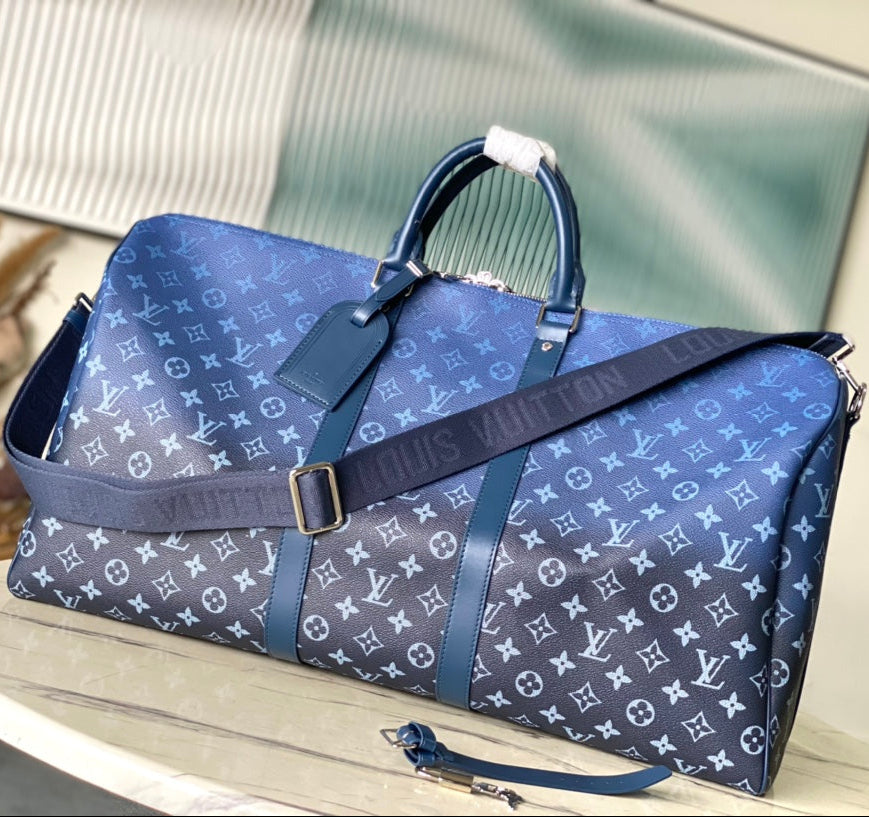 Sac à bandoulière KEEPALL 55 en toile monogrammée vert marine à dégradé