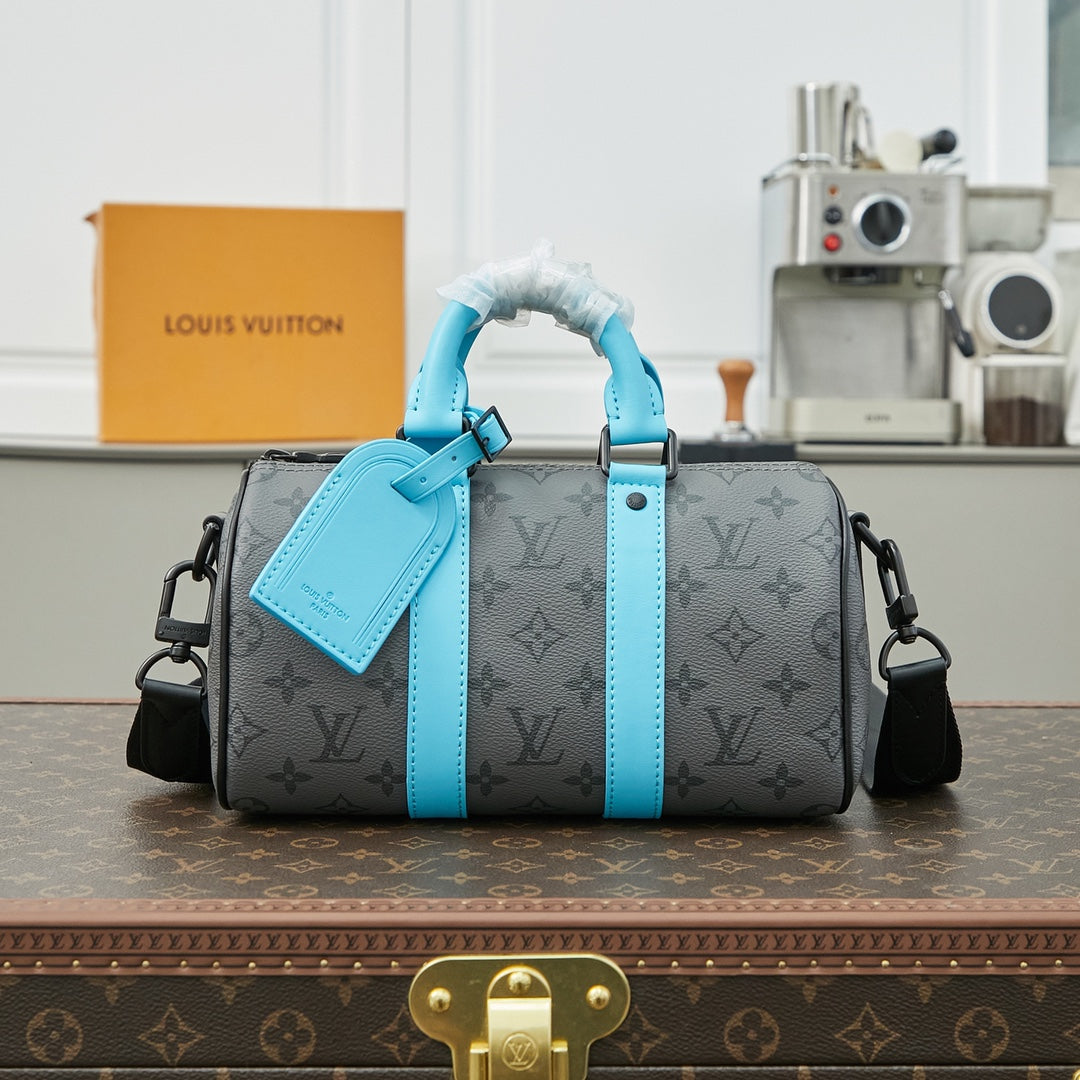 KEEPALL BANDOULIÈRE 25 EN MÉTAL GAZON MONOGRAMME ECLIPSE TOILE MIXTE CUIR DE VEAU TURQUOISE